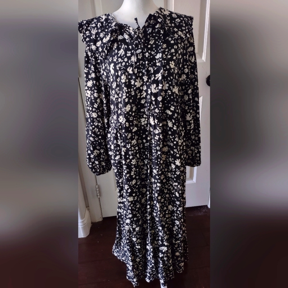 Black 80s inspired dress with Off white flowers.